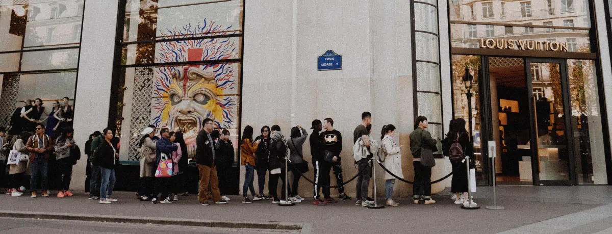 Queue of people outside a store