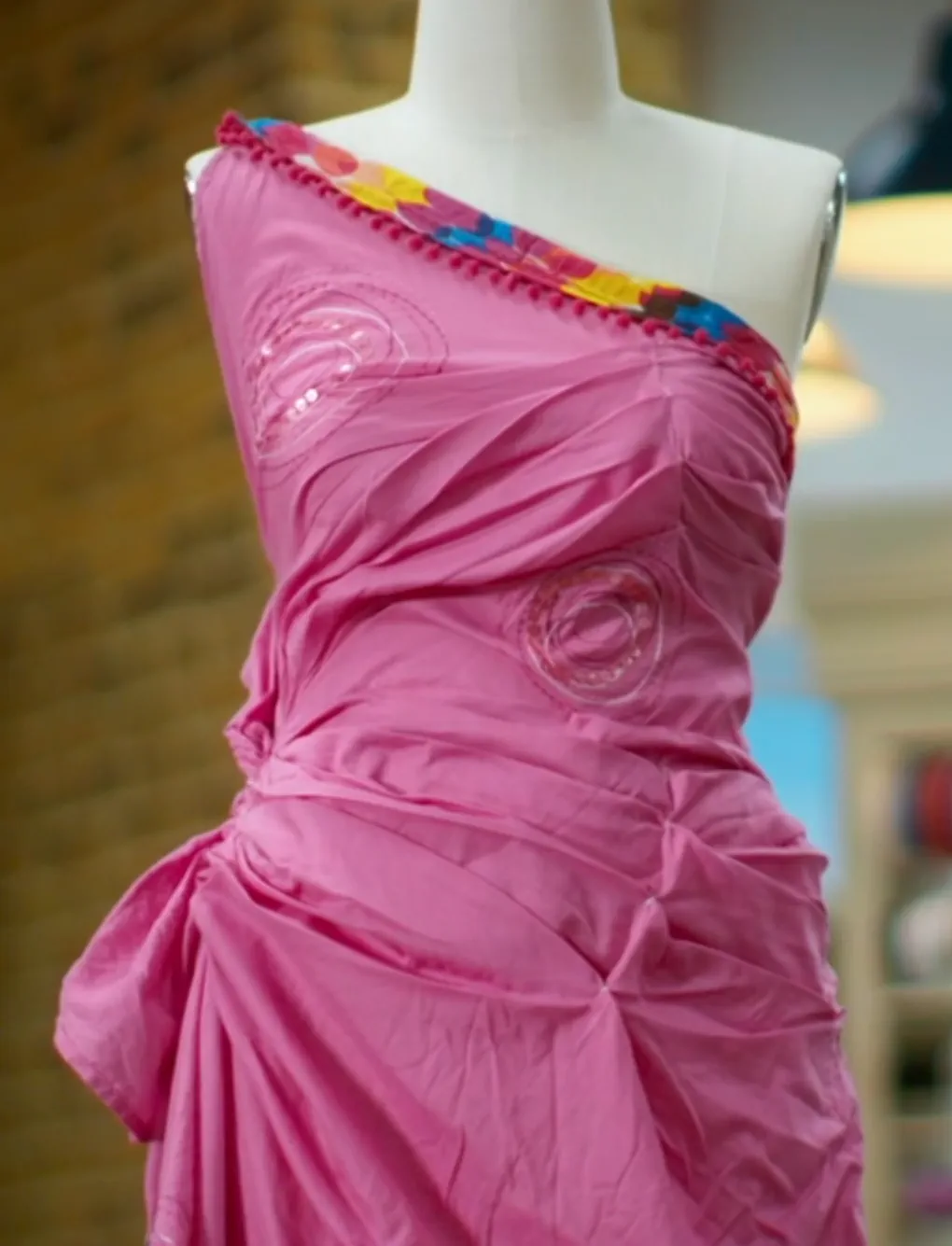 A pink dress made by upcycling a sarong