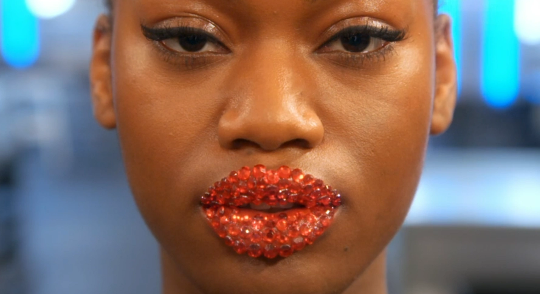 Model with a finished Jewelled Lip look